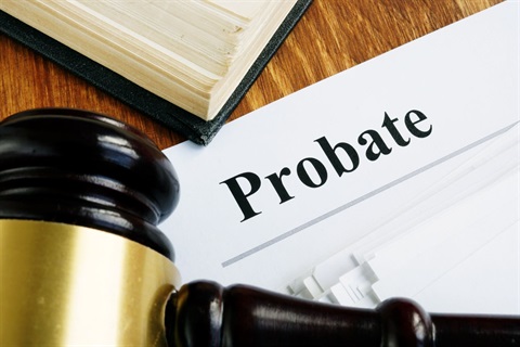 Probate image with a gavel and files on a desk that say probate