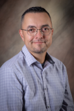 Headshot portrait of County Engineer Eric Ulibarri